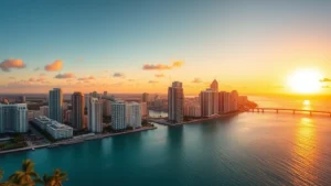 Aerial view of Miami skyline with Biscayne Bay, turquoise water, and high-rise buildings during golden hour sunset, palm trees visible, vibrant cityscape, photorealistic travel photography